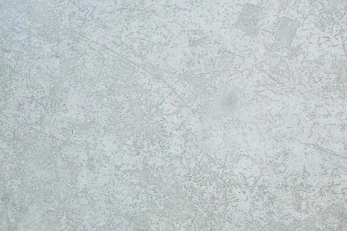 Close-up of a gray concrete surface with subtle texture.