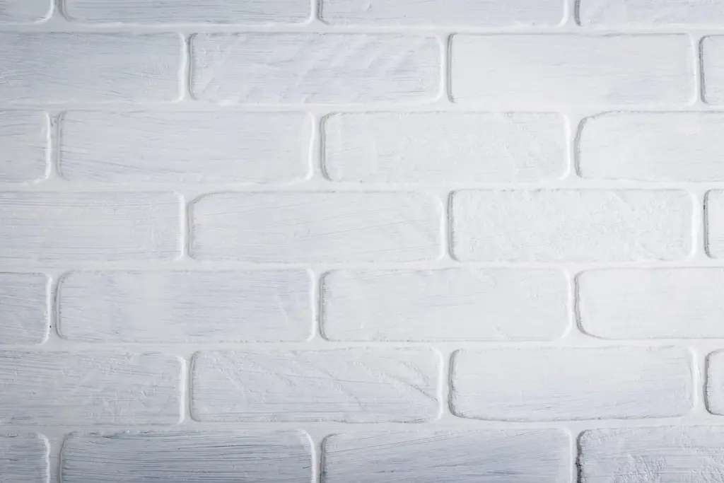 How Do You Cover and Decorate a Shared Garage Wall?