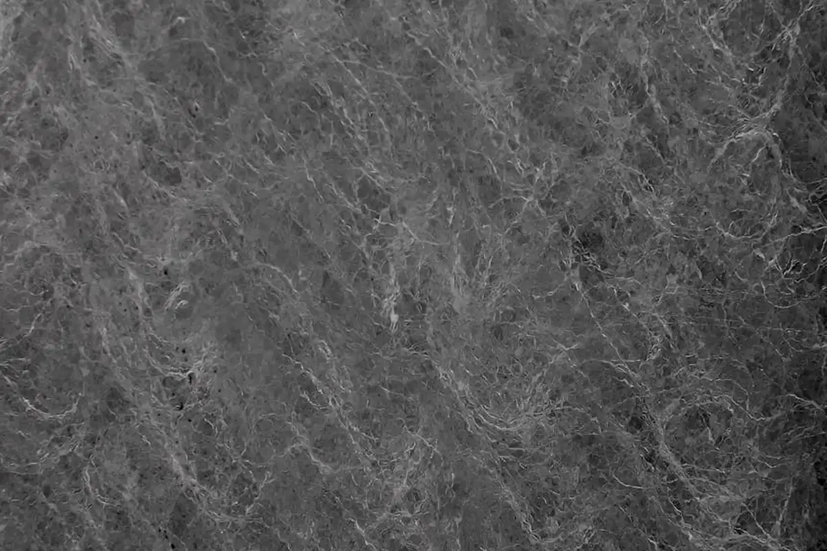 Close-up gray marble-like texture suggesting a cold, frosty garage surface.