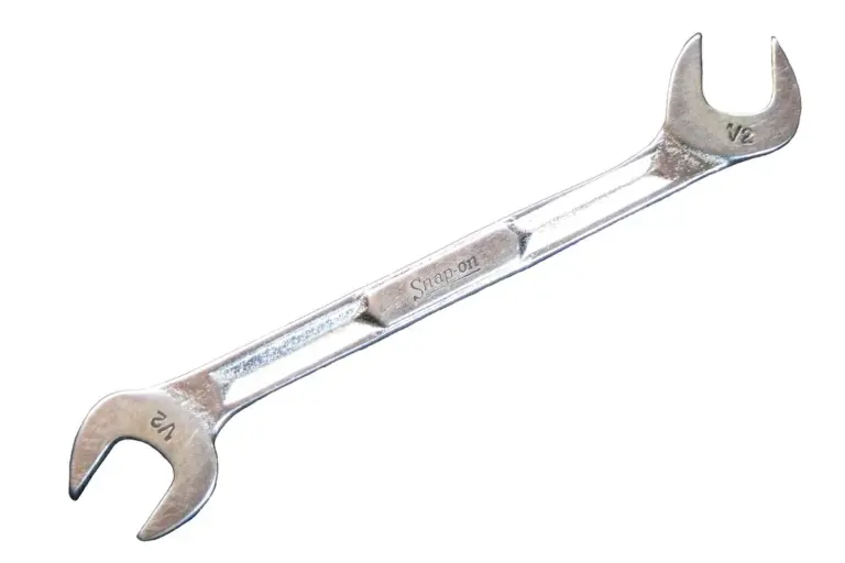 Open-ended wrench on a white background, representing garage tool organization