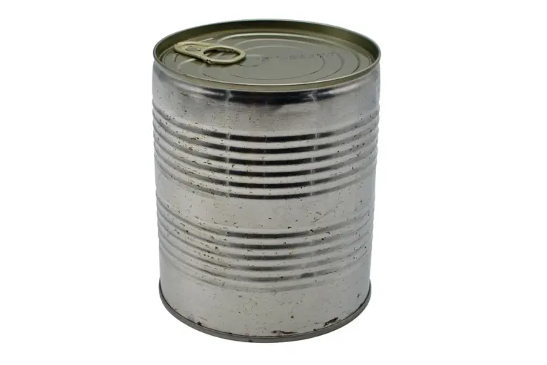 A metal paint can with a sealed lid, showing a slightly worn exterior.