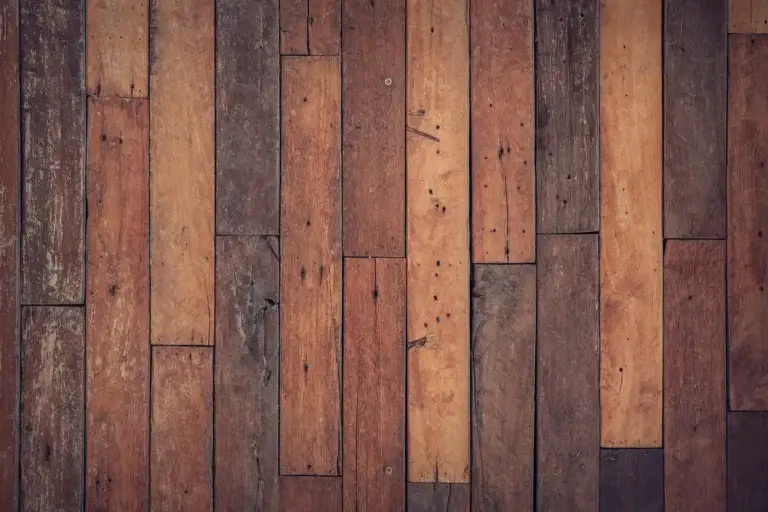 Close-up of wooden floor planks in varying brown tones
