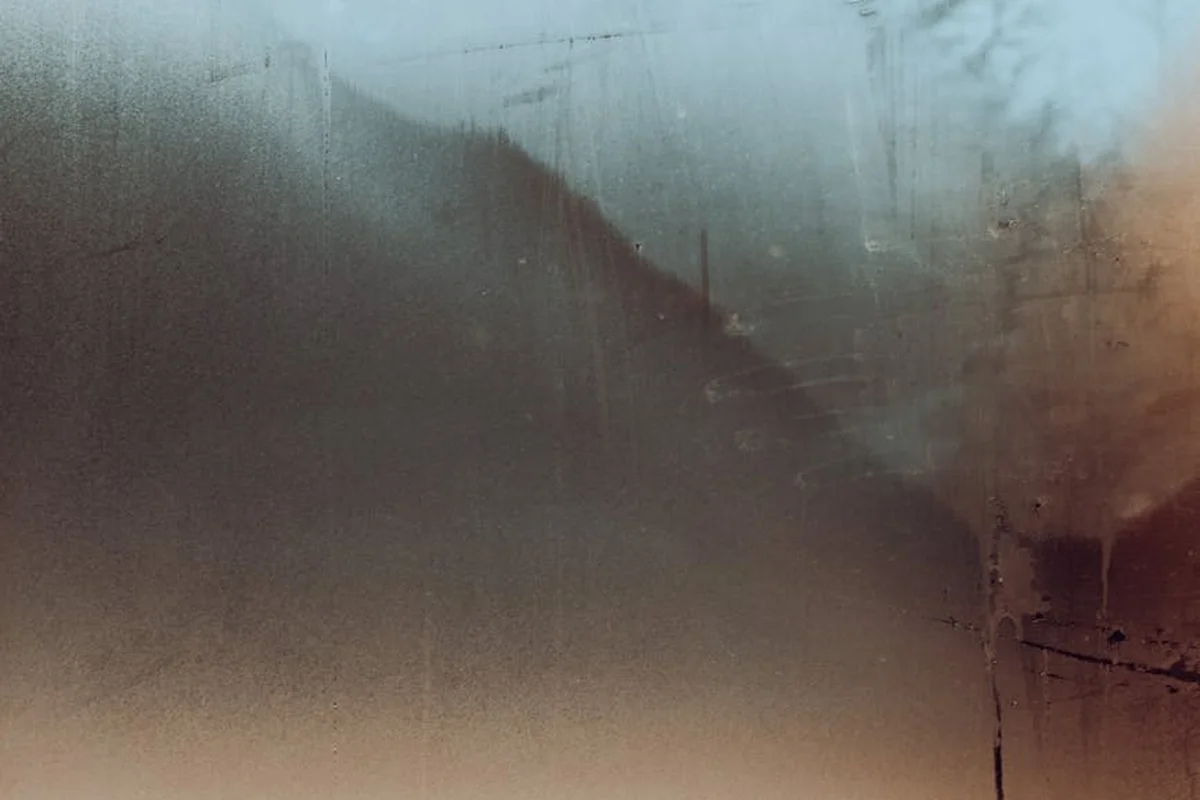 Foggy, translucent surface suggesting moisture on a vapor barrier